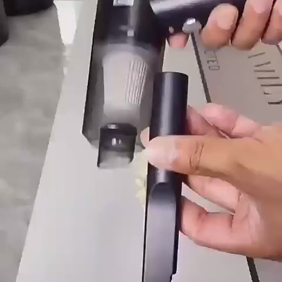 Aspirador portátil para tapizados de coche sin cables