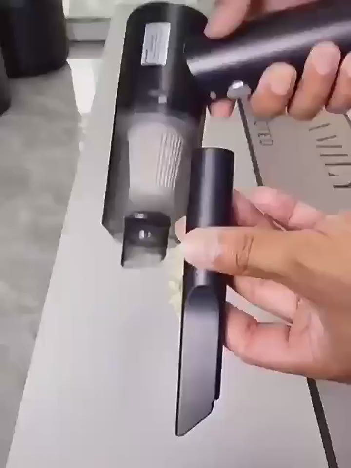 Aspirador portátil para tapizados de coche sin cables
